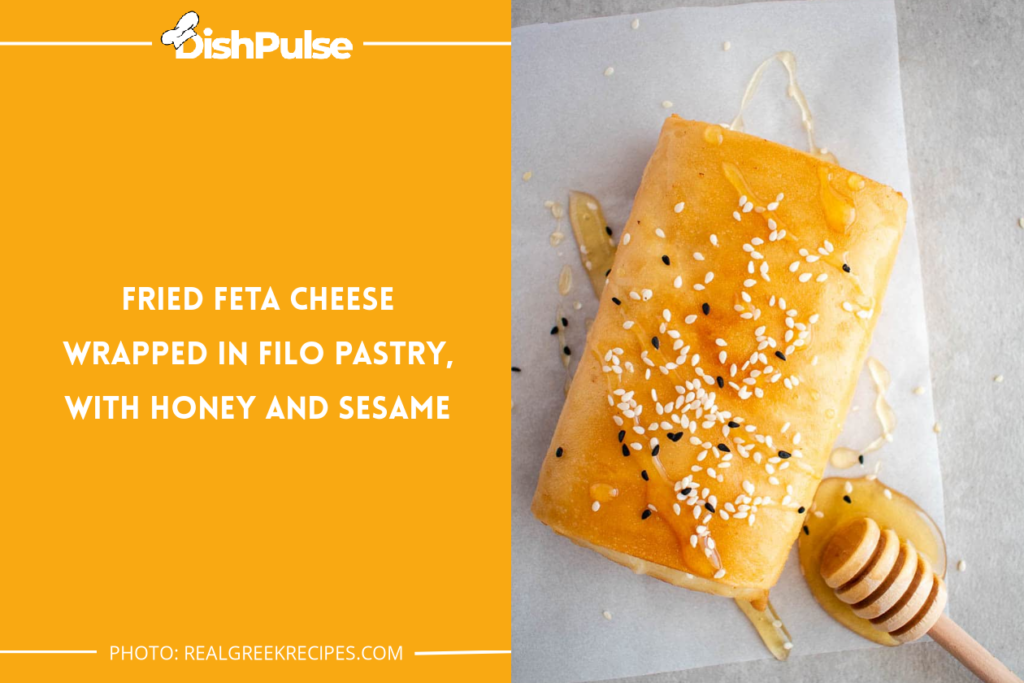 Fried Feta Cheese Wrapped In Filo Pastry, With Honey And Sesame