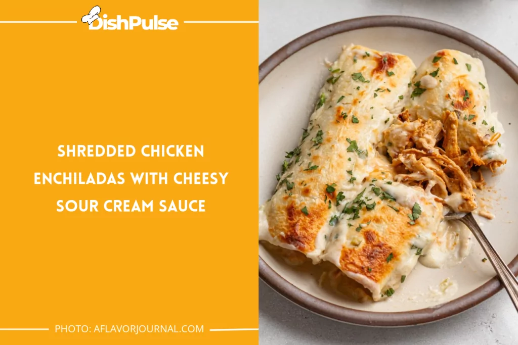 Shredded Chicken Enchiladas with Cheesy Sour Cream Sauce